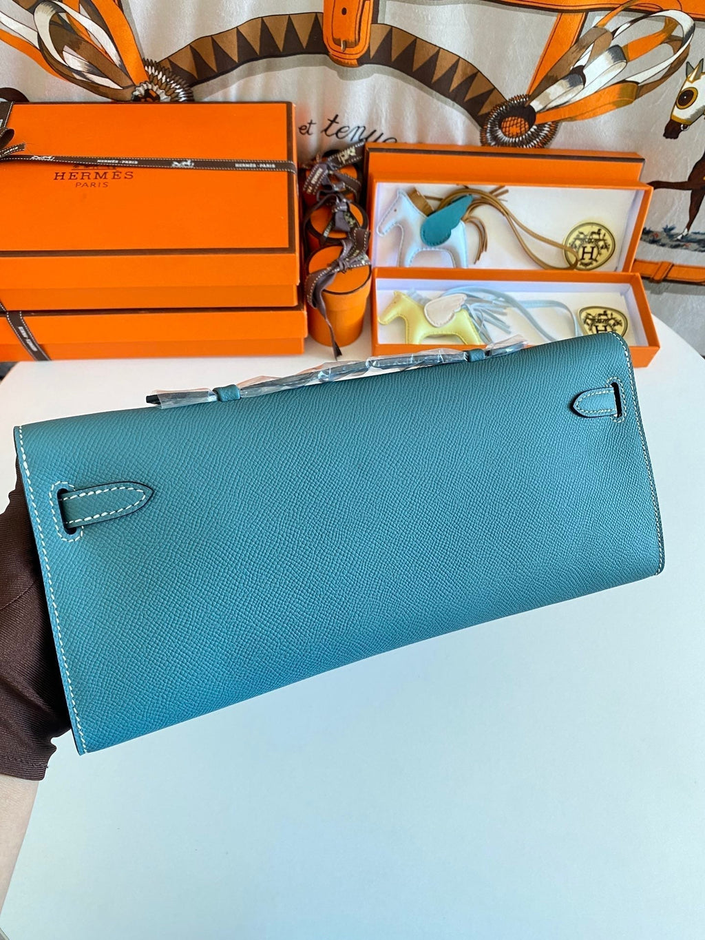 HERMES KELLY CUT 31 IN AZURE BLUE CALFSKIN WITH SILVER HARDWARE