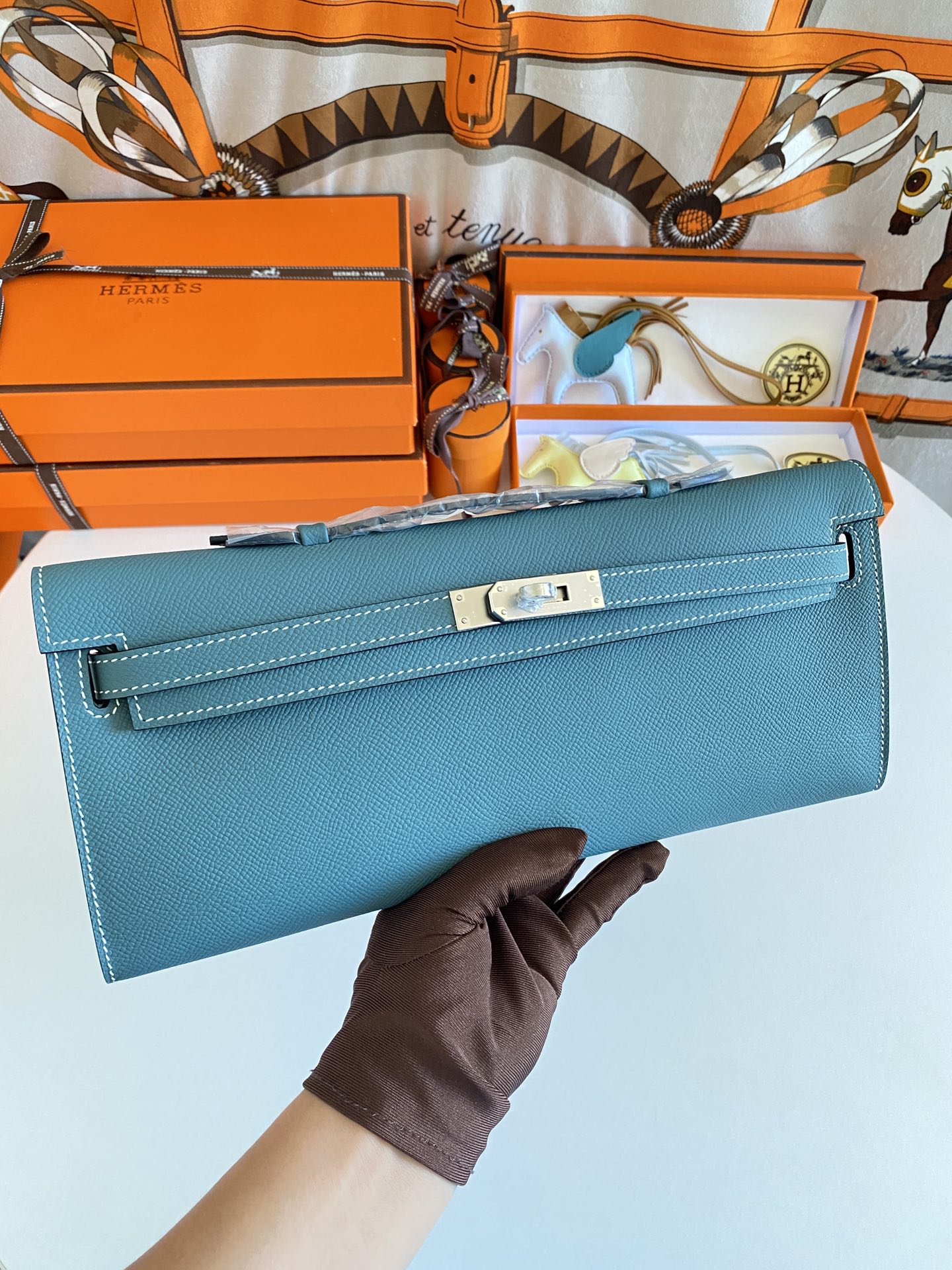 HERMES KELLY CUT 31 IN AZURE BLUE CALFSKIN WITH SILVER HARDWARE