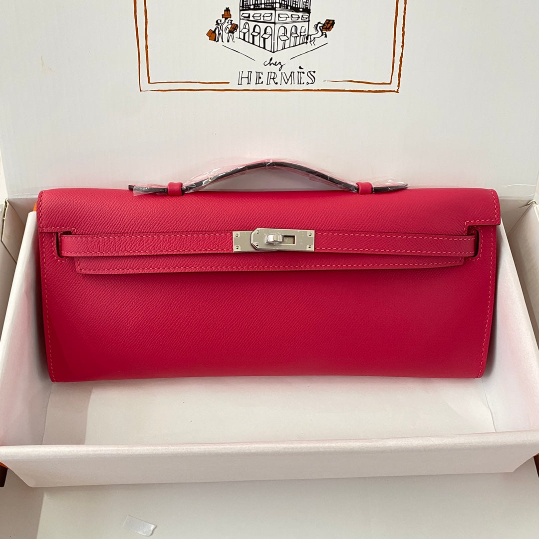 HERMES KELLY CUT 31 IN CHERRY RED CALFSKIN WITH SILVER HARDWARE