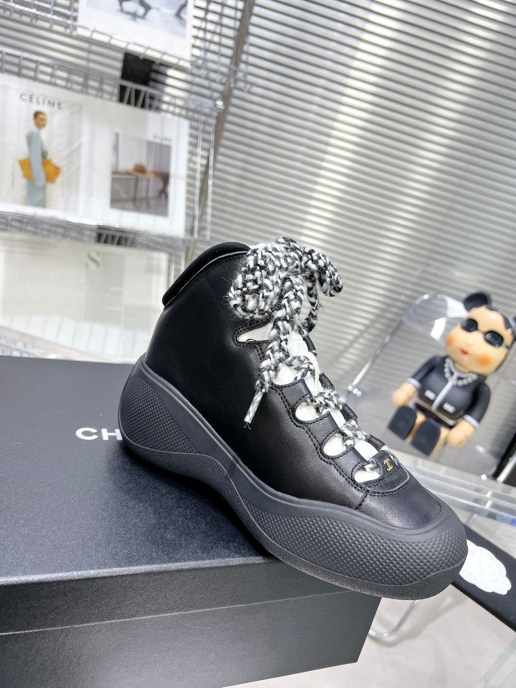 CHANEL CANO ALTO SNEAKER IN BLACK CALFSKIN AND RUBBER