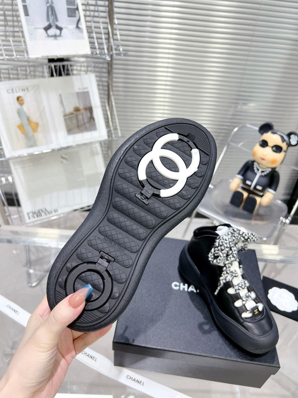 CHANEL CANO ALTO SNEAKER IN BLACK CALFSKIN AND RUBBER
