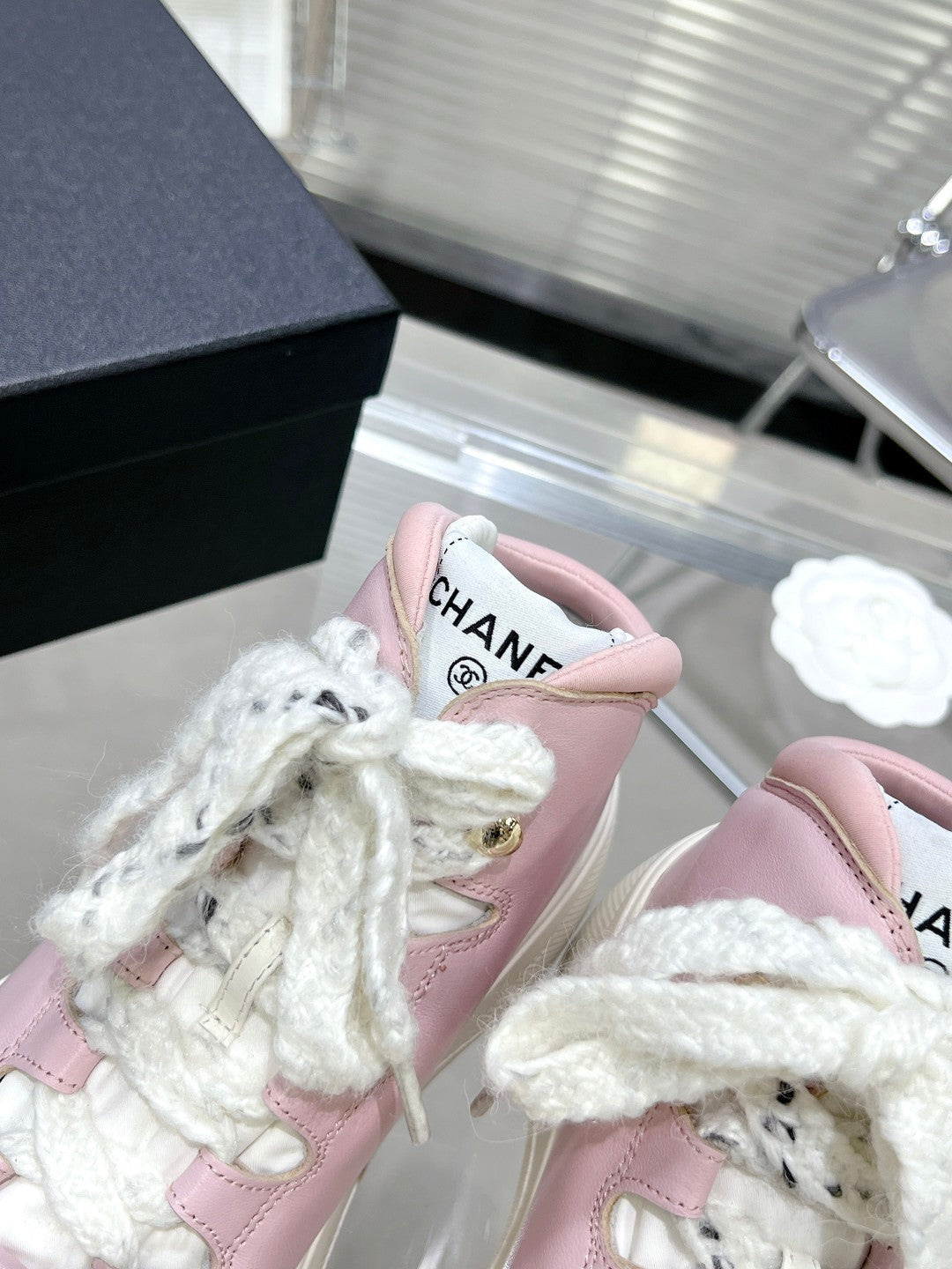 CHANEL CANO ALTO SNEAKER IN BLUSH PINK CALFSKIN AND WHITE RUBBER