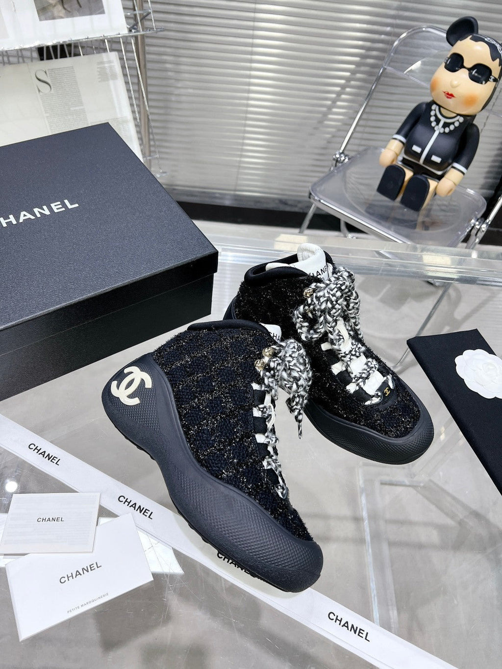 CHANEL CANO ALTO SNEAKER IN BLACK TWEED AND RUBBER