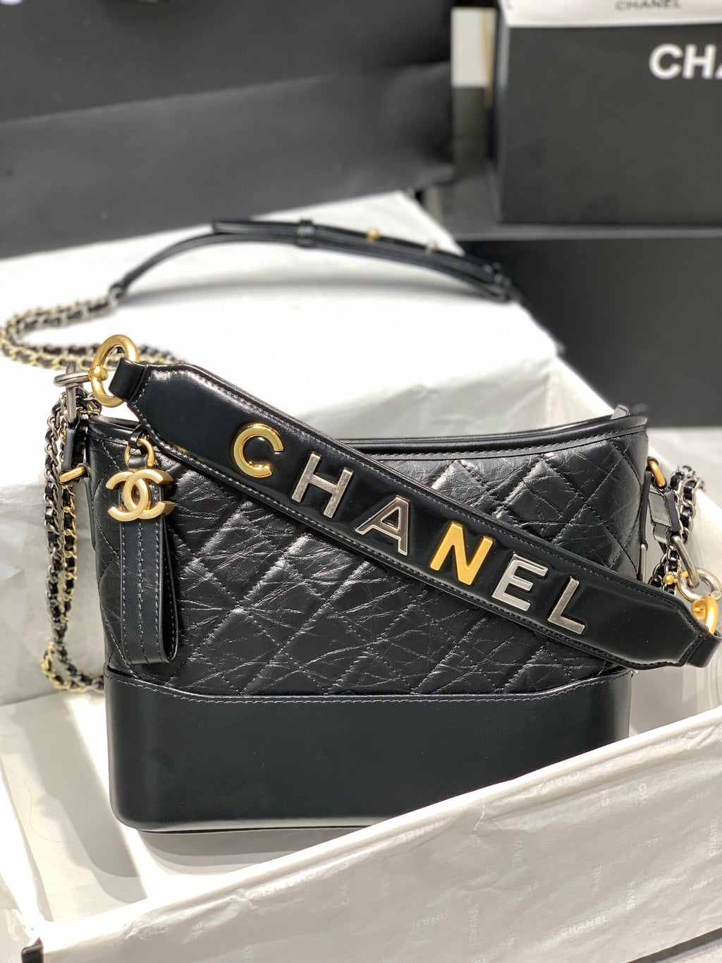 CHANEL HOBO BAG 25 WITH STRAP IN BLACK CALFSKIN GOLD AND SILVER HARDWARE