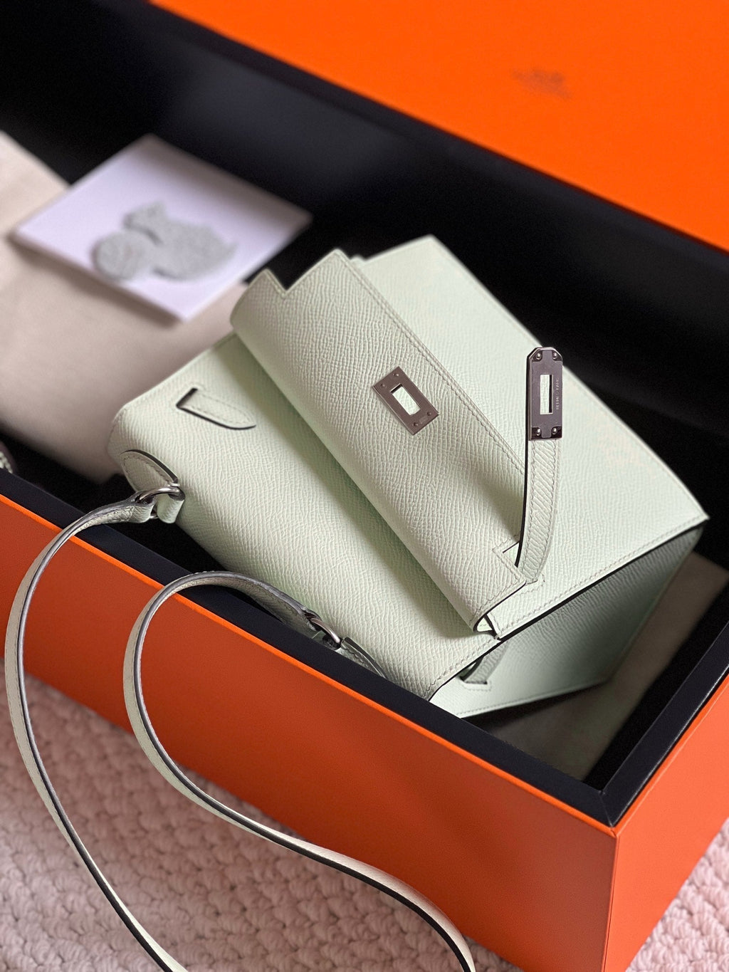 HERMES KELLY DESORDRE 20 IN WHITE EPSOM LEATHER WITH SILVER HARDWARE