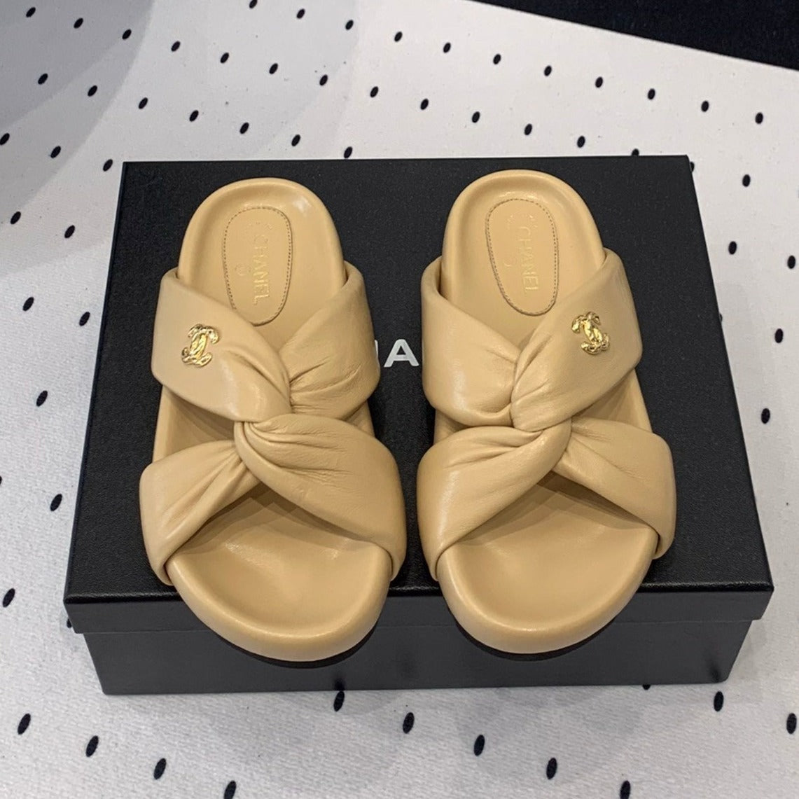 CHANEL TWISTED SLIPPERS IN DARK CREAM LAMBSKIN