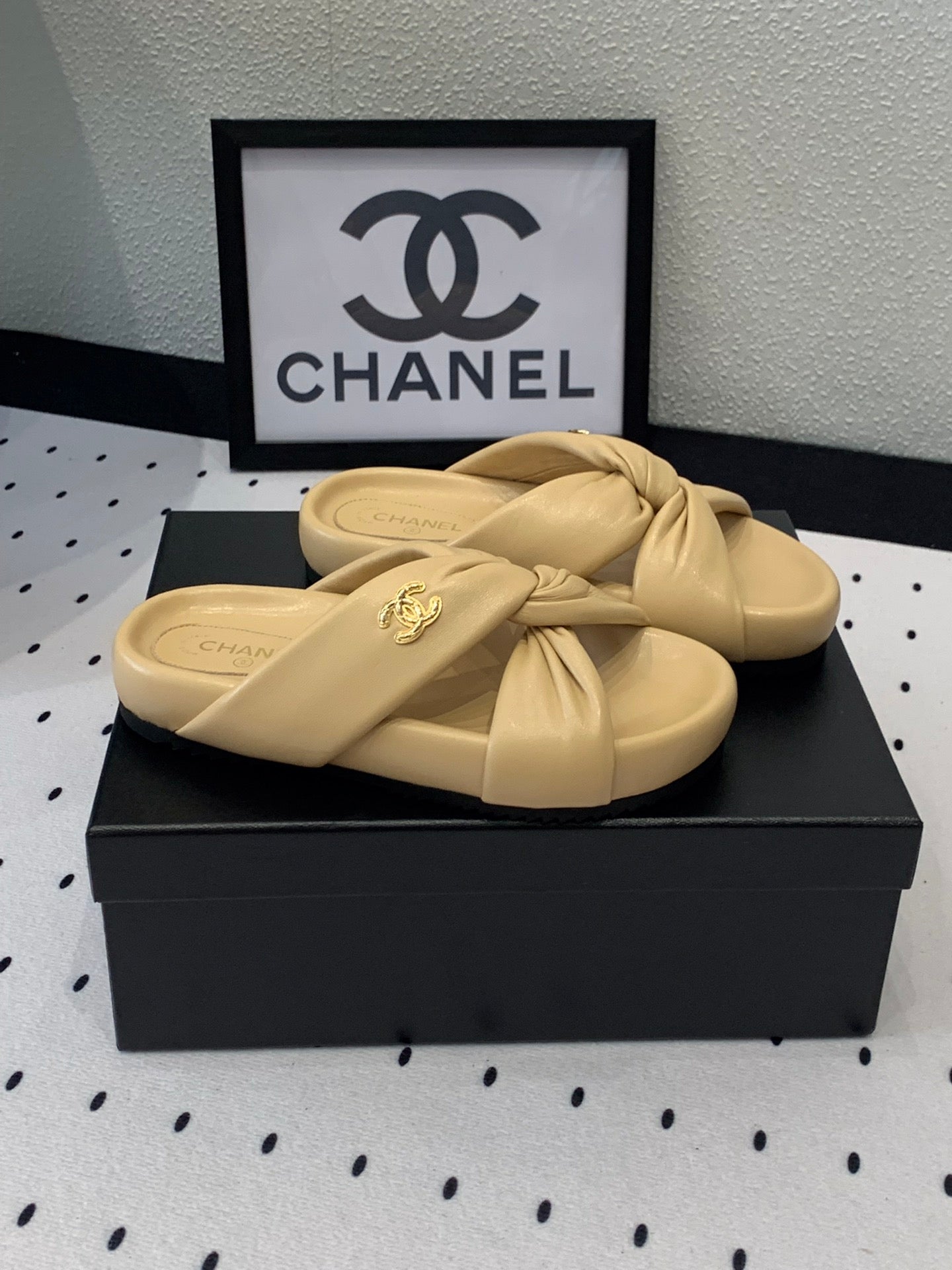 CHANEL TWISTED SLIPPERS IN DARK CREAM LAMBSKIN