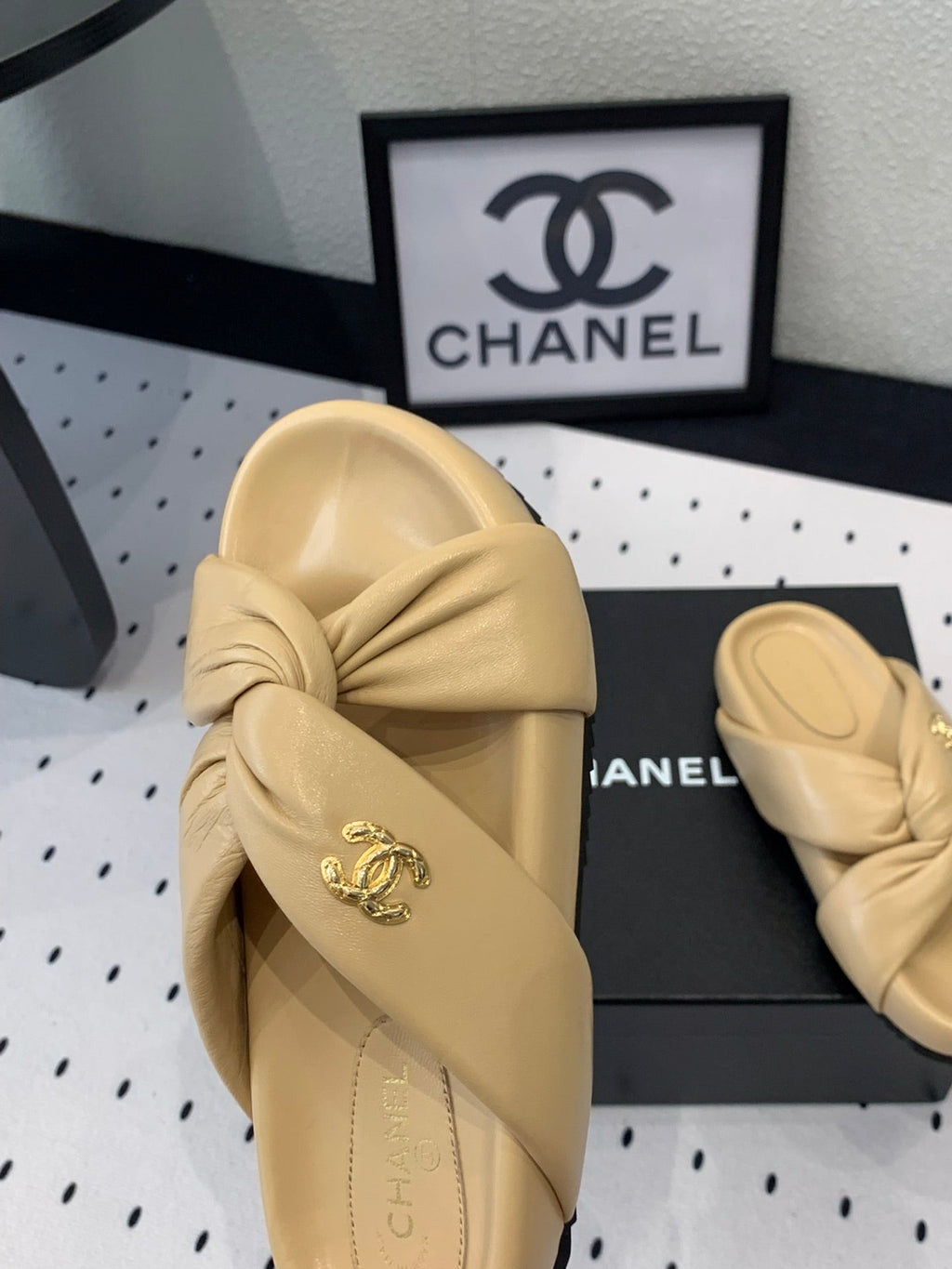 CHANEL TWISTED SLIPPERS IN DARK CREAM LAMBSKIN