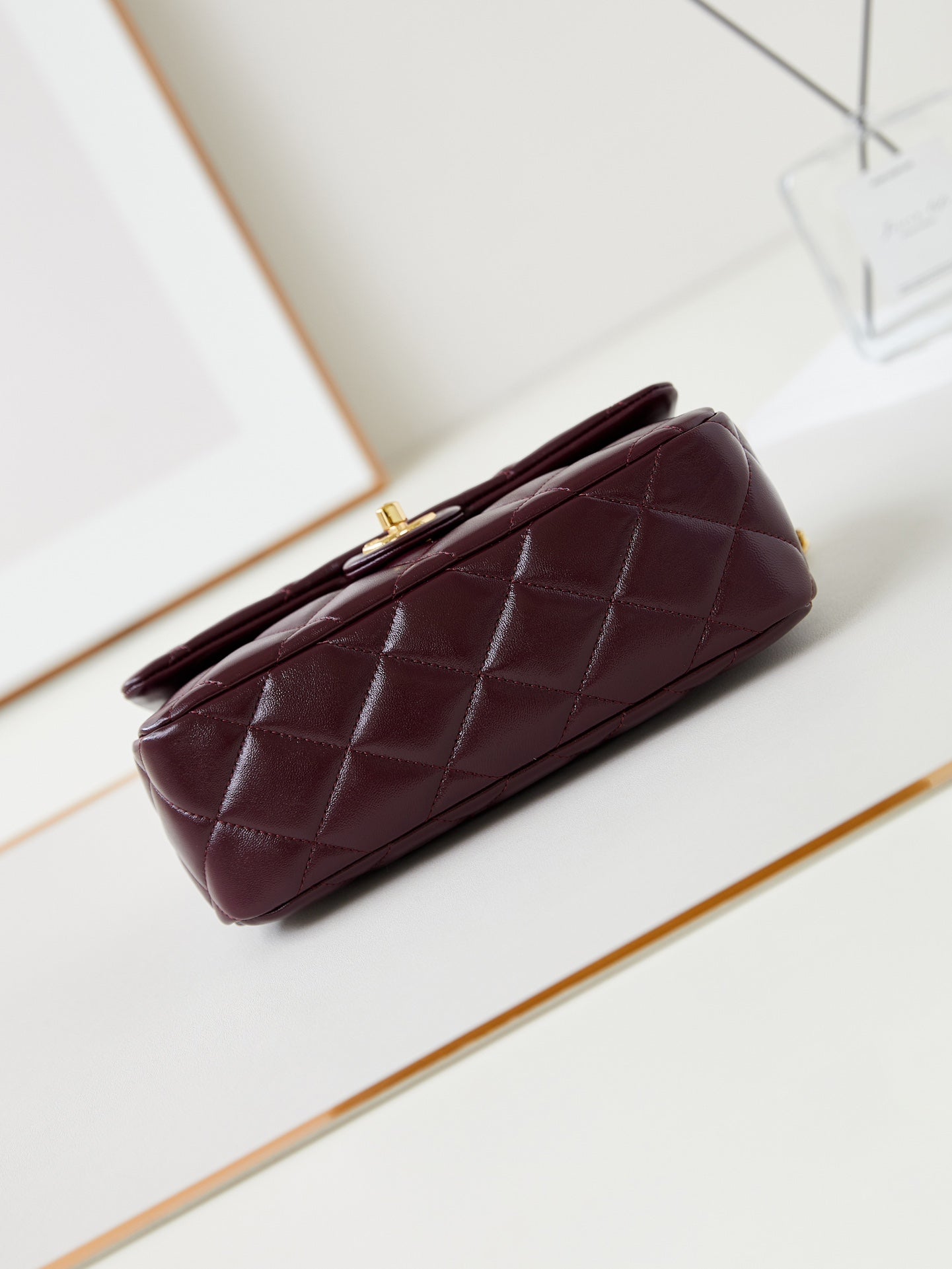 CHANEL FLAP BAG WITH TOP HANDLE 25 IN WINE RED OIL-WAX LAMBSKIN GOLD HARDWARE