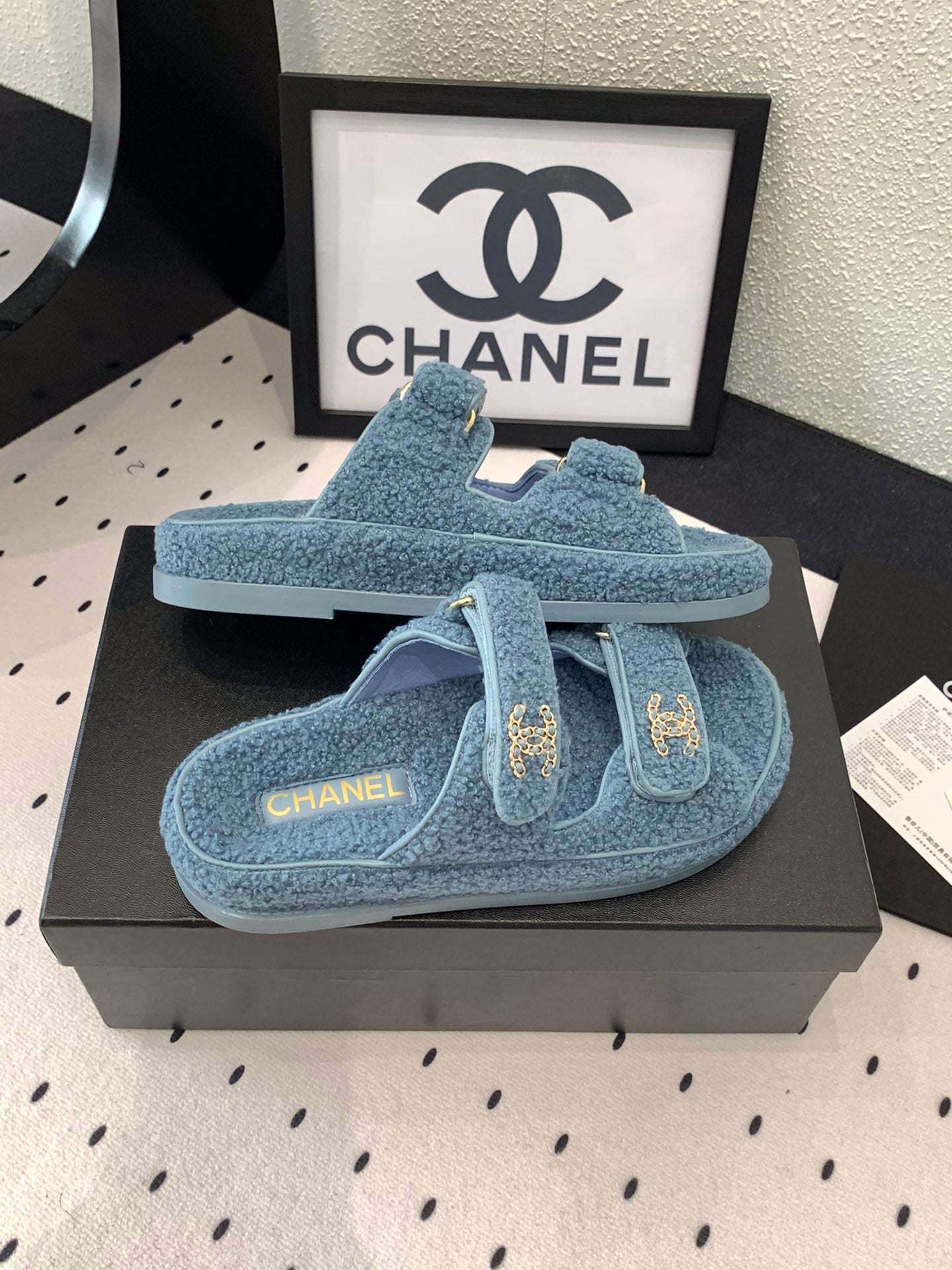CHANEL DAD SANDAL MULE IN AEGEAN BLUE LAMB FUR