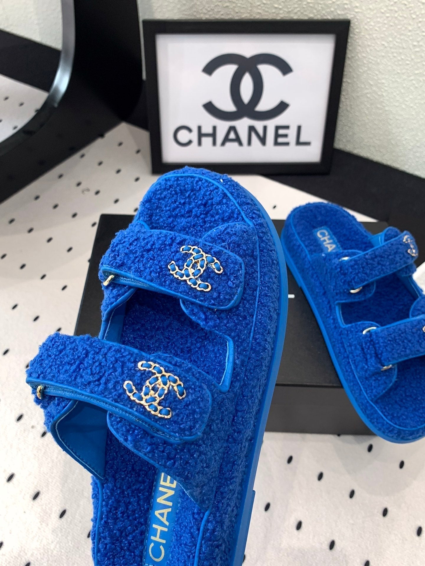 CHANEL DAD SANDAL MULE IN AZURE BLUE LAMB FUR