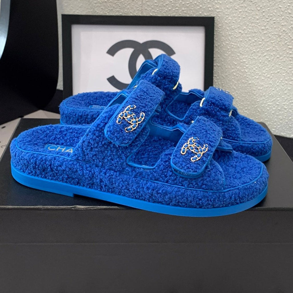 CHANEL DAD SANDAL MULE IN AZURE BLUE LAMB FUR