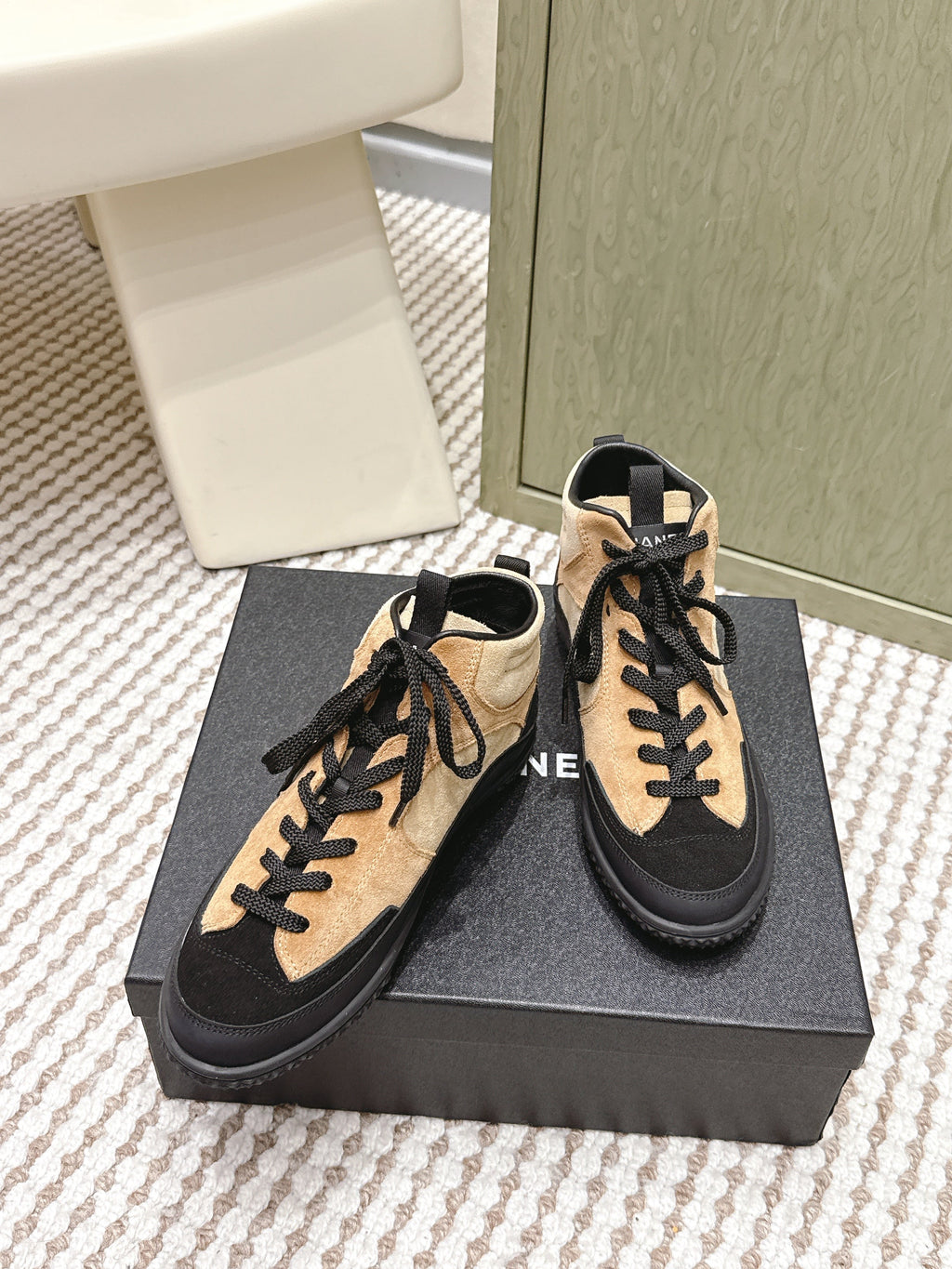 CHANEL 25S HIGH-TOP SNEAKERS IN BLACK AND BROWN CALFSKIN AND SUEDE