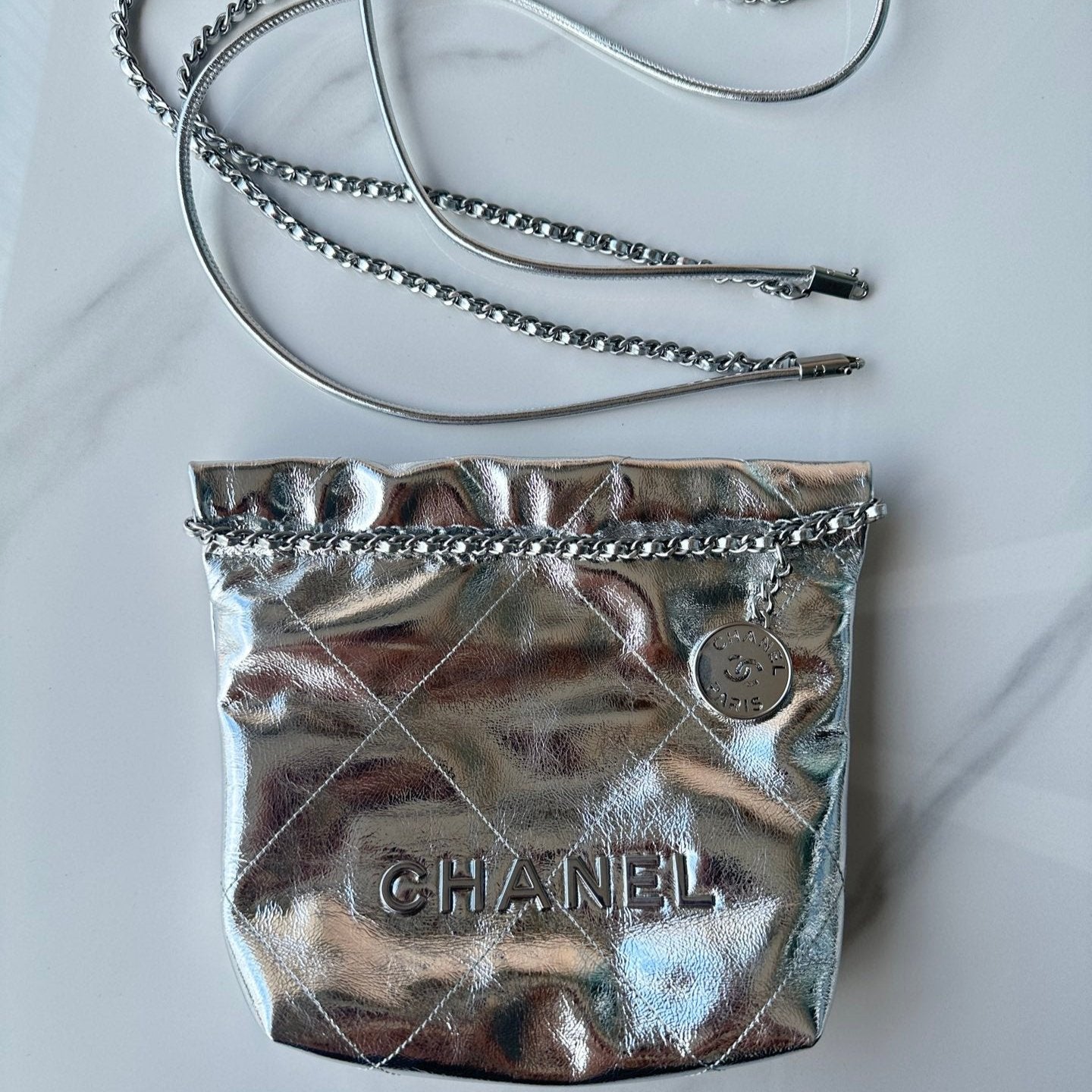 CHANEL MINI 20 BAG IN SILVER METALLIC LAMBSKIN
