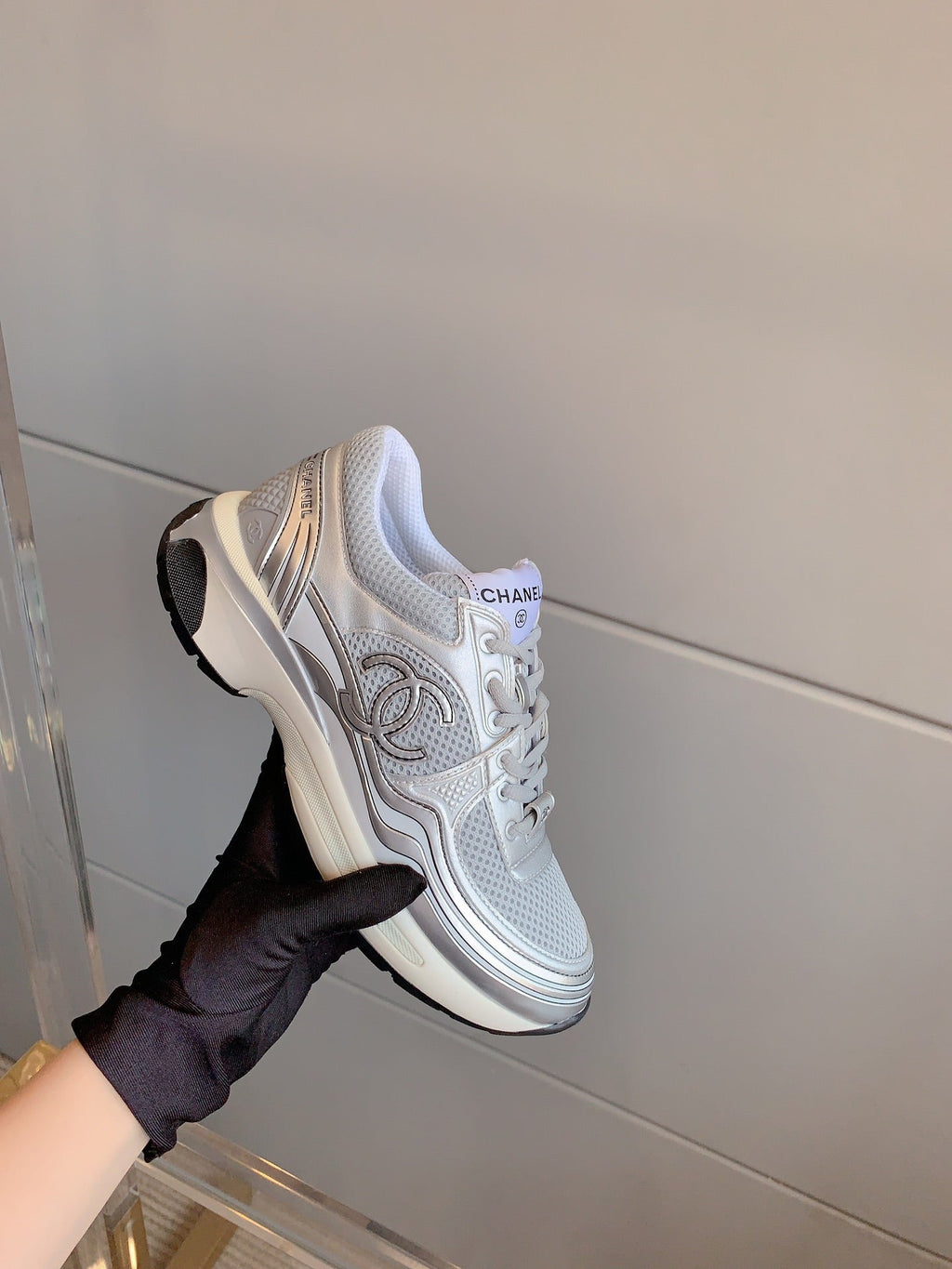 CHANEL SNEAKERS IN GLOSSY SILVER CALFSKIN AND MESH