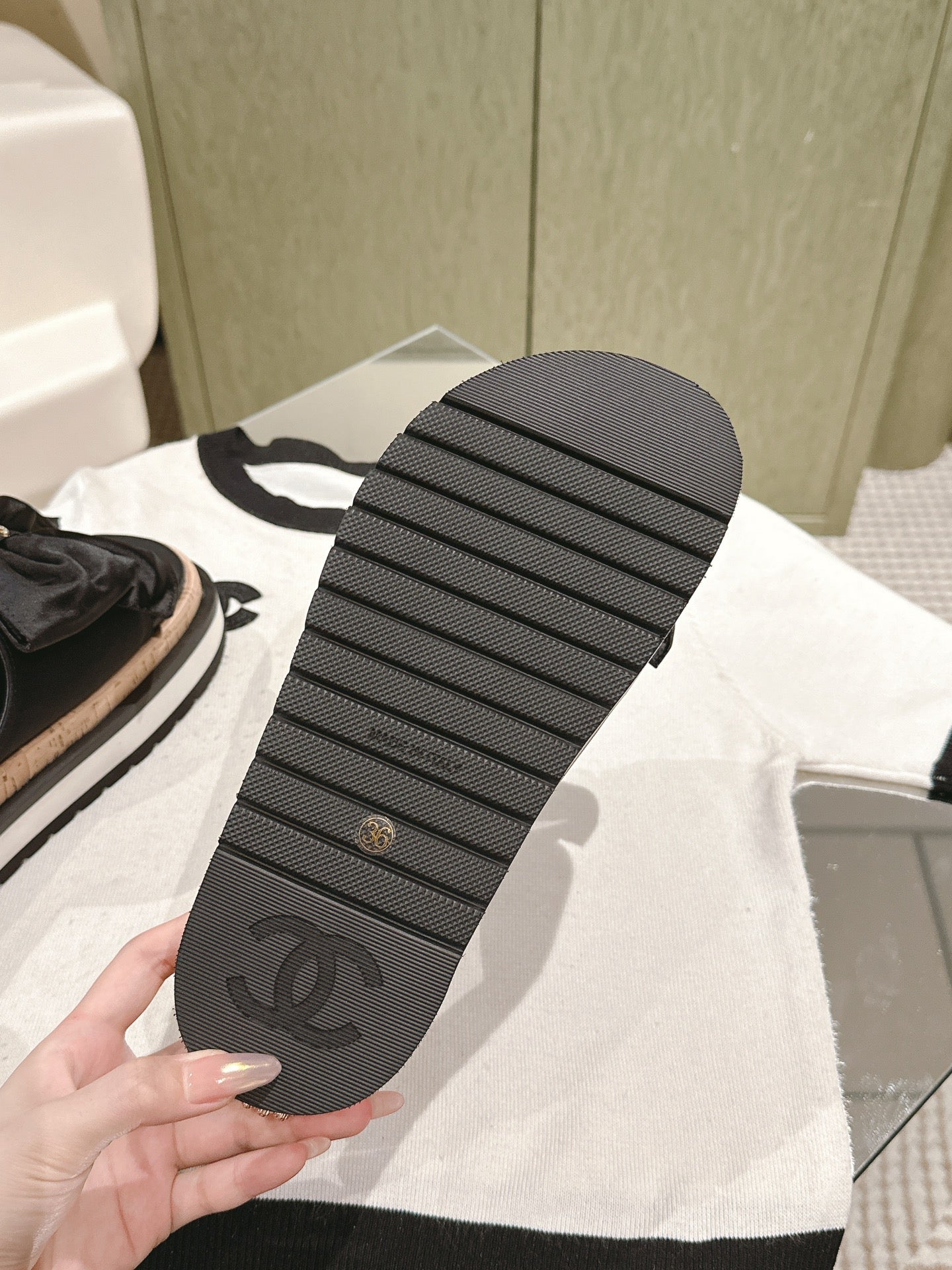 CHANEL SLIPPERS WITH SILK BOW IN BLACK COWHIDE