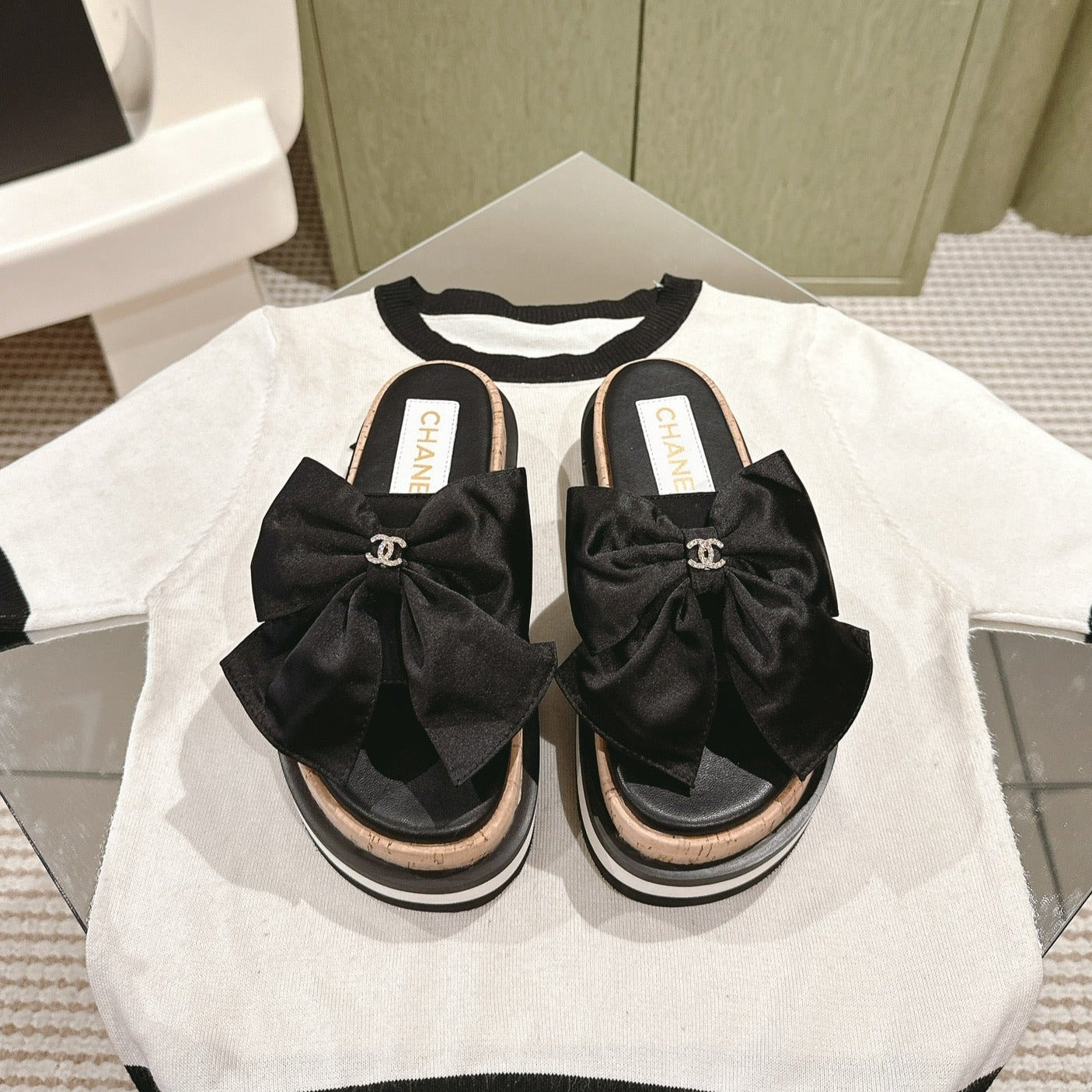CHANEL SLIPPERS WITH SILK BOW IN BLACK COWHIDE