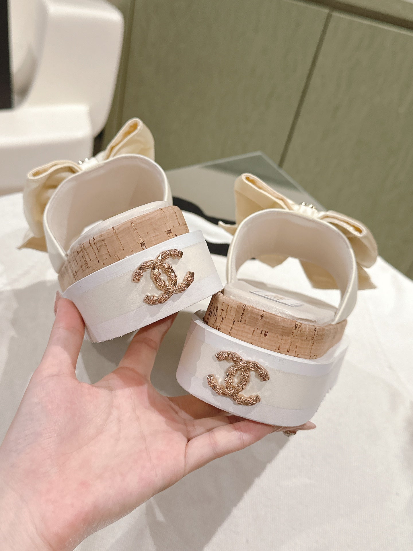 CHANEL SLIPPERS WITH SILK BOW IN WHITE COWHIDE