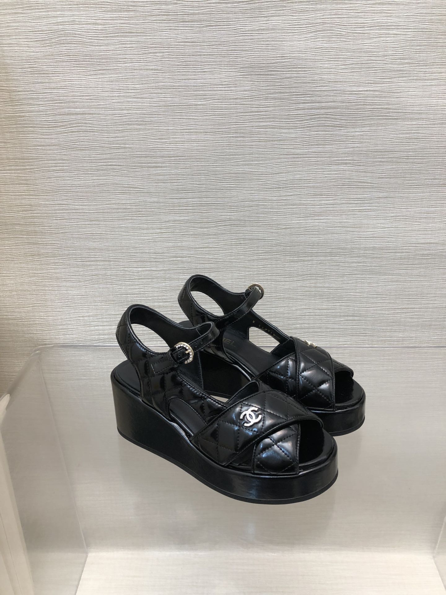 CHANEL WEDGE SANDALS IN BLACK CALFSKIN