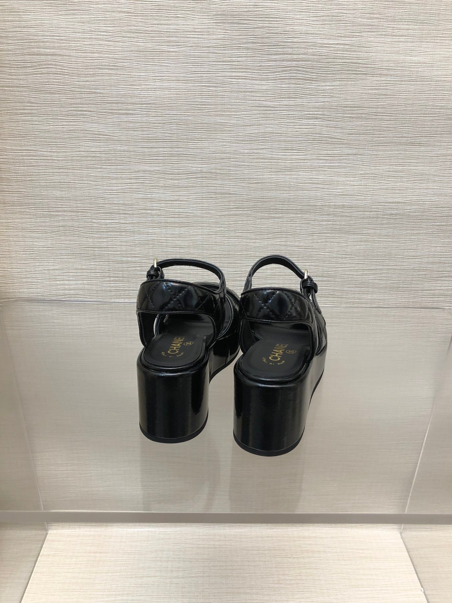CHANEL WEDGE SANDALS IN BLACK CALFSKIN