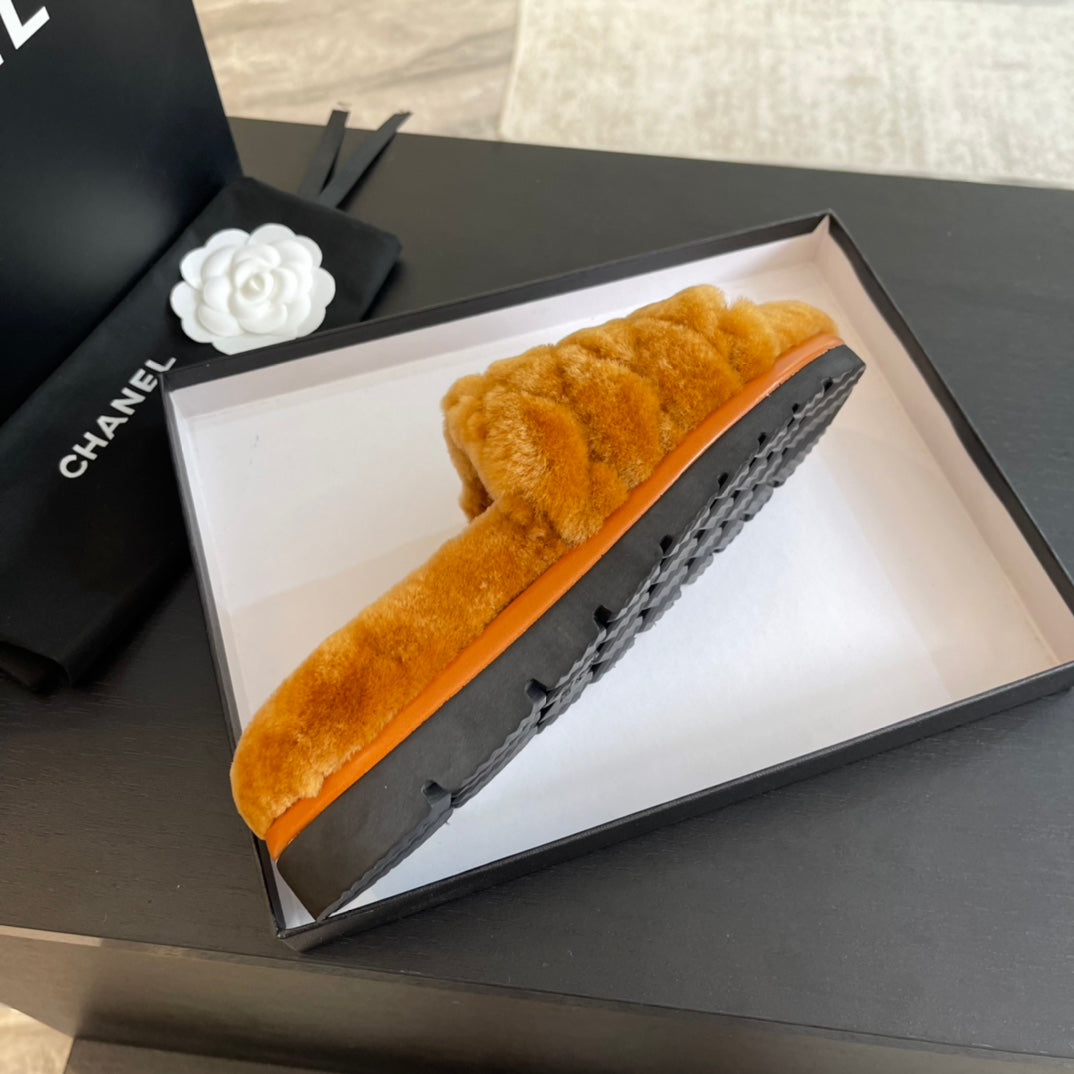 CHANEL SLIPPERS IN SAFETY ORANGE FUR