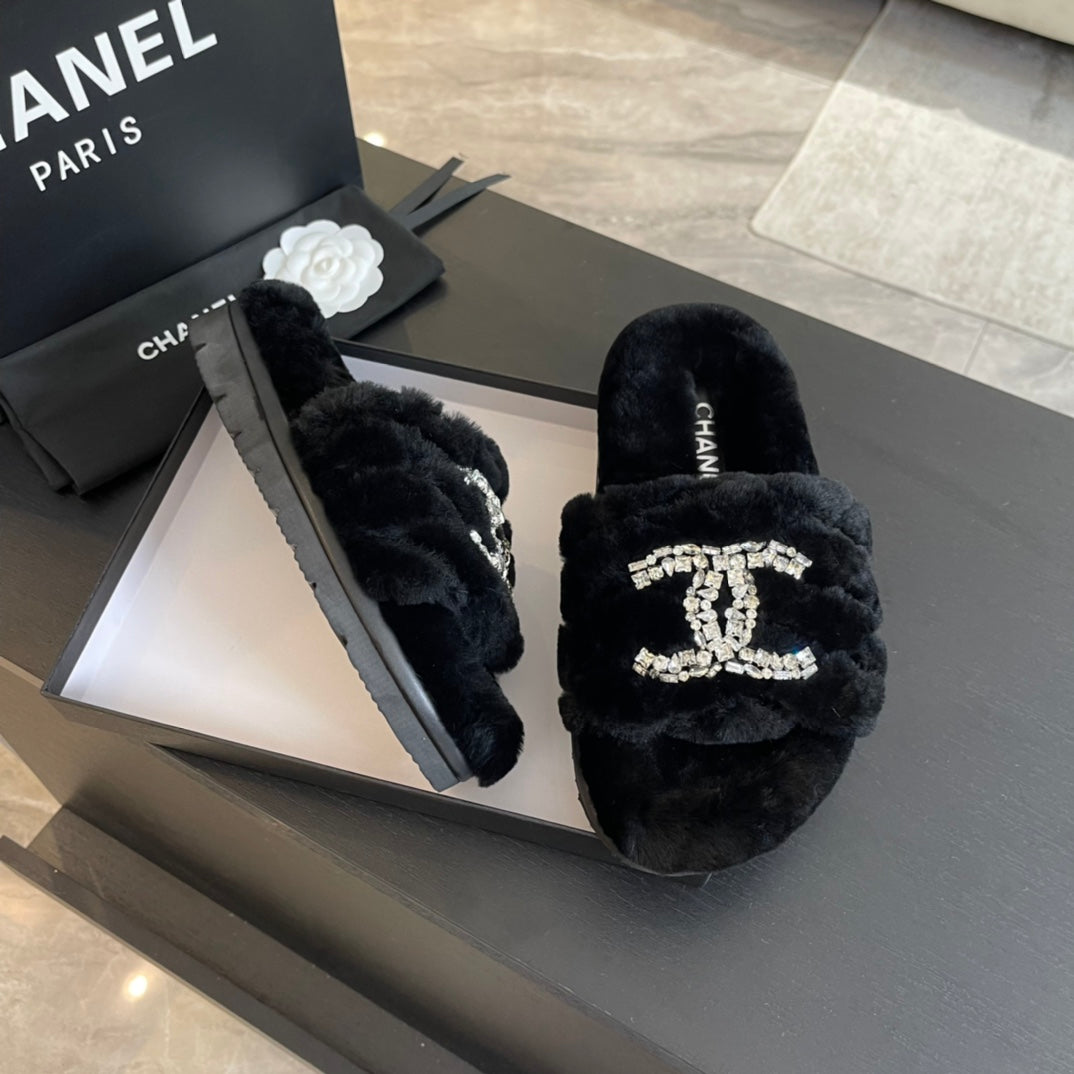 CHANEL SLIPPERS IN BLACK FUR
