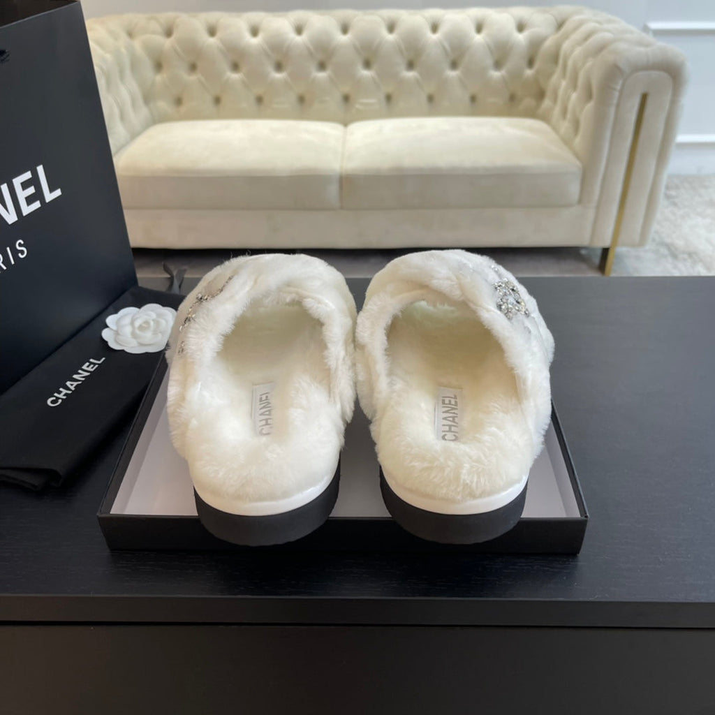 CHANEL WHITE FUR CROSS STRAP SLIPPERS