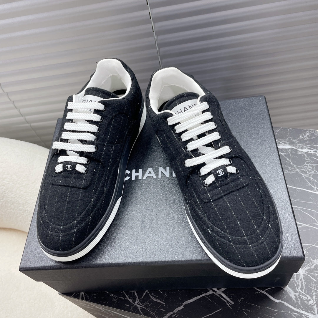CHANEL TRAINER SHOES IN BLACK WOOL FABRIC