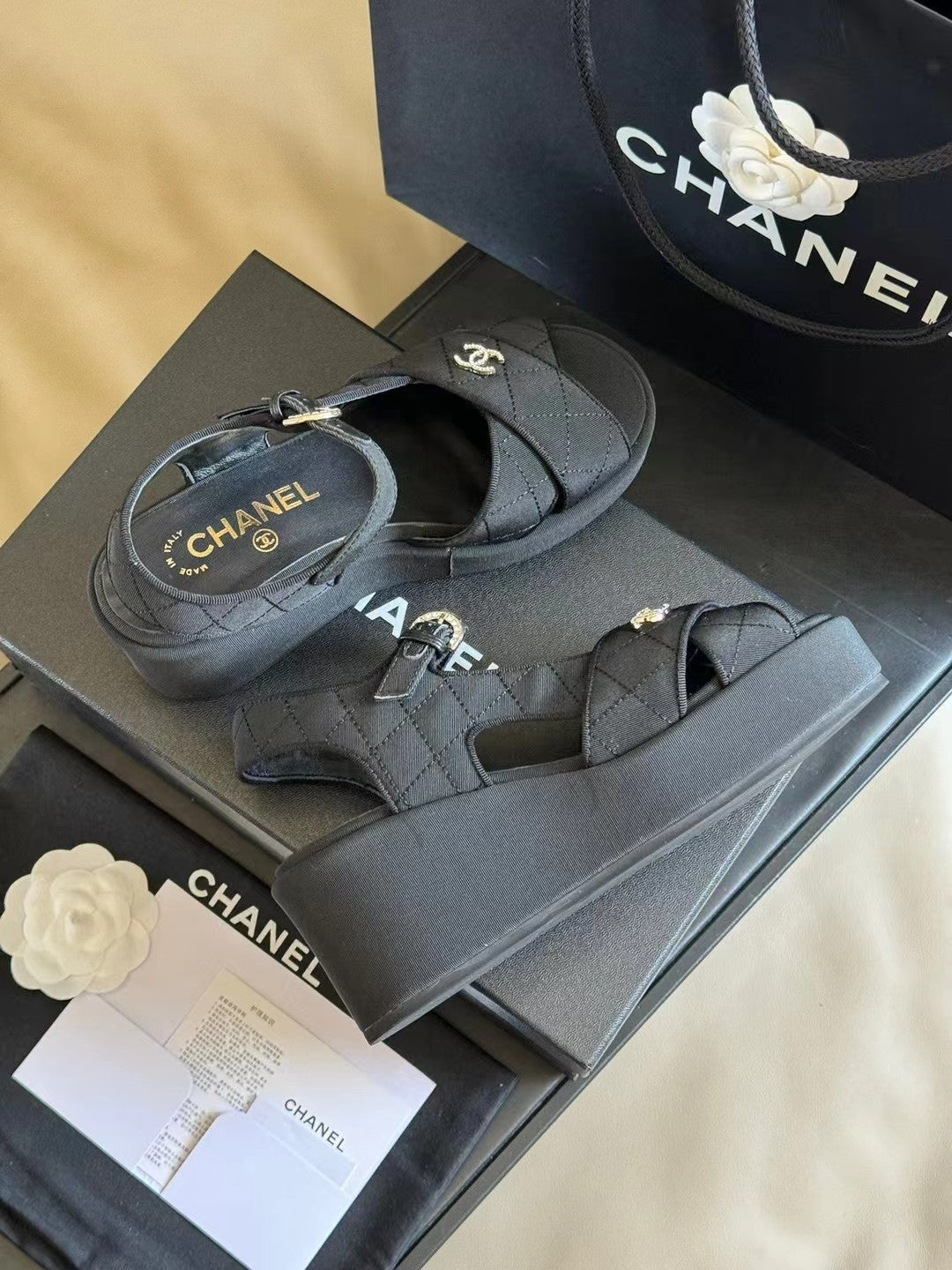 CHANEL CLASSIC WEDGE SANDALS IN BLACK FABRIC