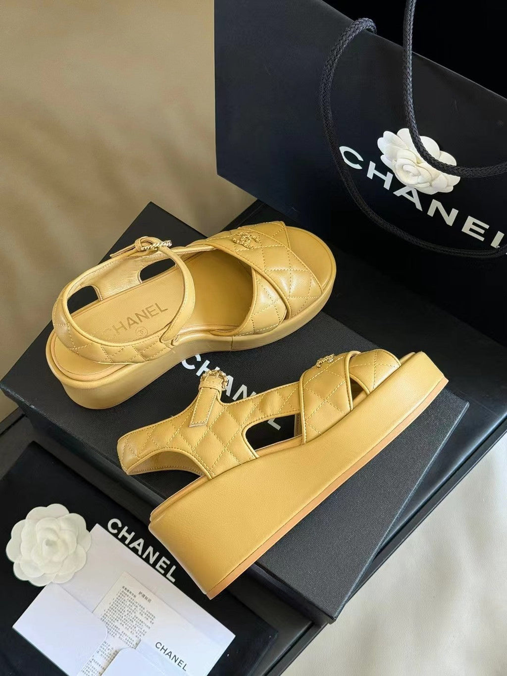 CHANEL CLASSIC WEDGE SANDALS IN LIGHT YELLOW LAMBSKIN