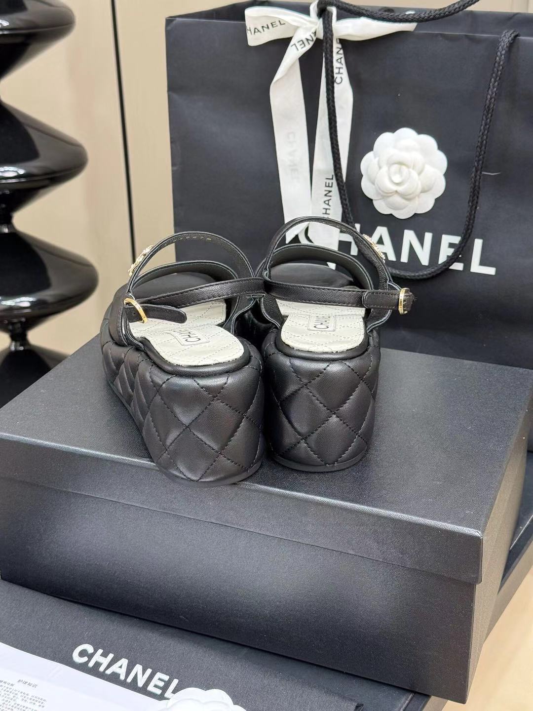CHANEL HIGH WEDGE SANDALS IN BLACK LAMBSKIN