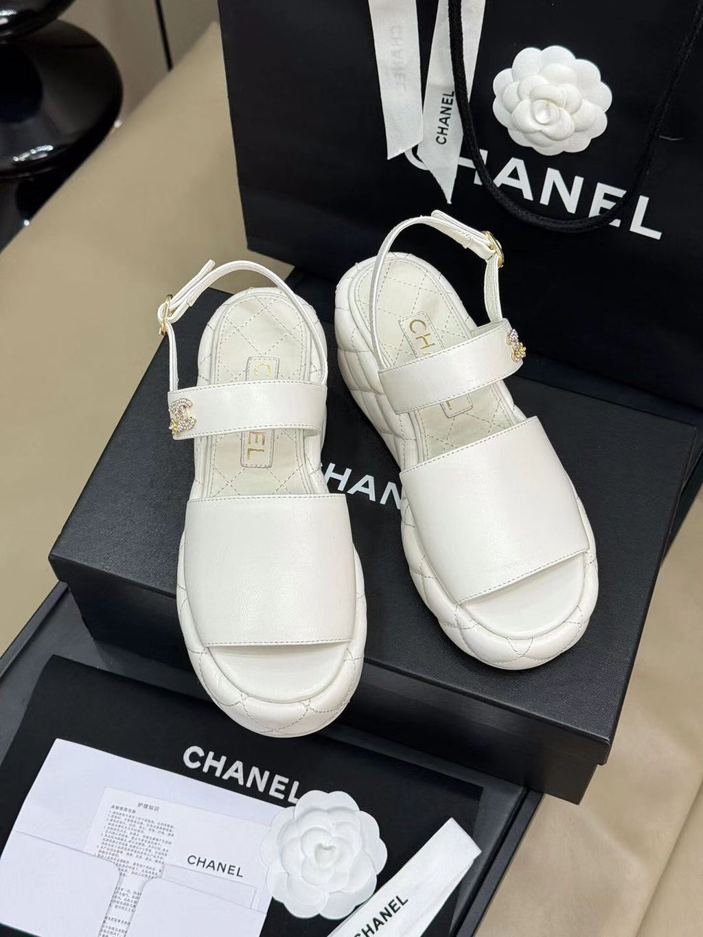 CHANEL HIGH WEDGE SANDALS IN WHITE LAMBSKIN