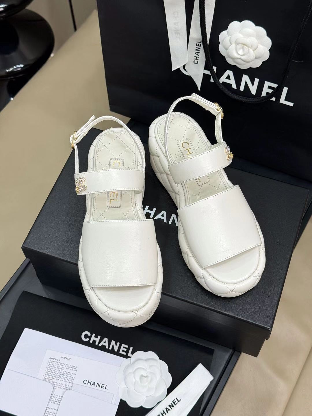 CHANEL HIGH WEDGE SANDALS IN WHITE LAMBSKIN
