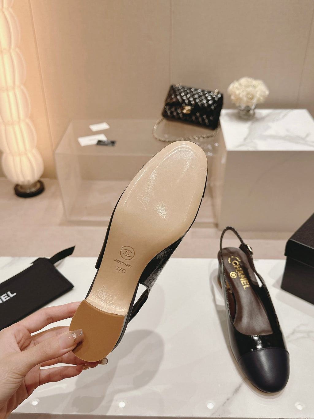 CHANEL SLINGBACKS IN BLACK SHEEPSKIN