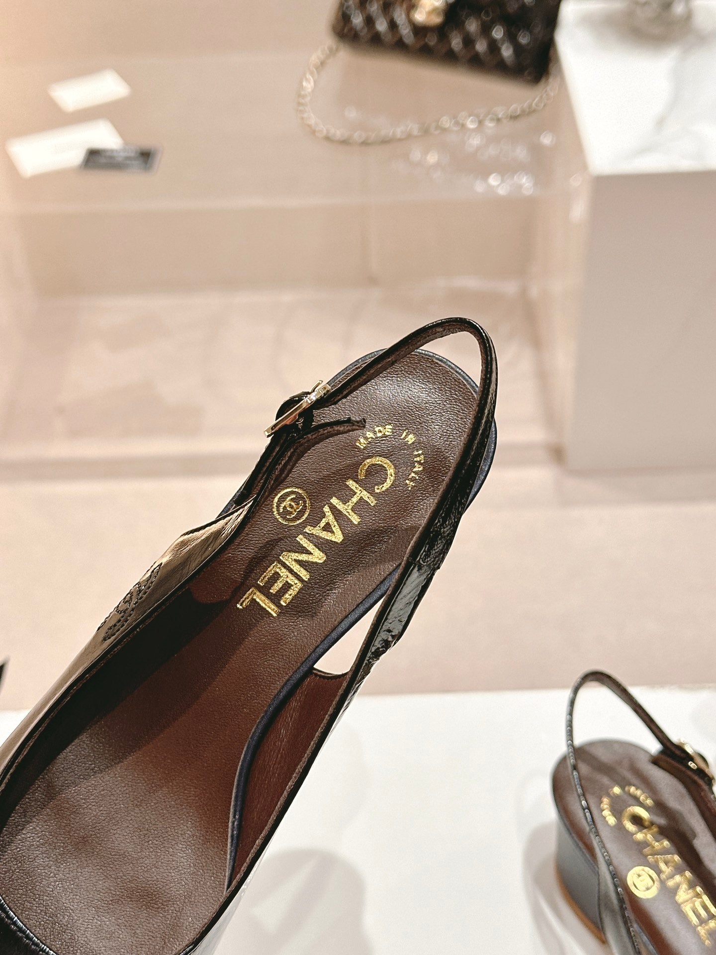CHANEL SLINGBACKS IN BLACK SHEEPSKIN