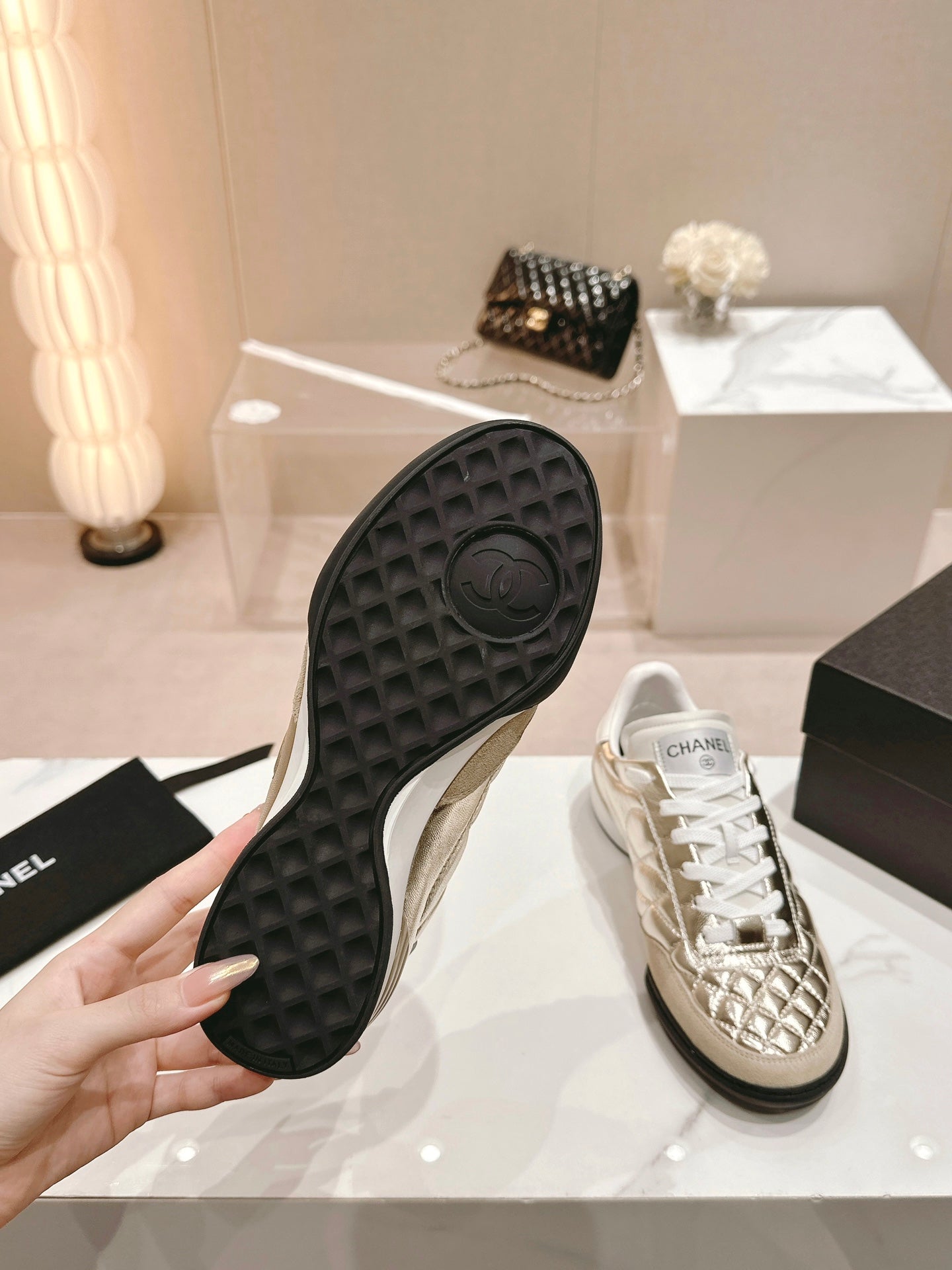 CHANEL SNEAKERS IN GLOSSY GOLDEN LAMBSKIN