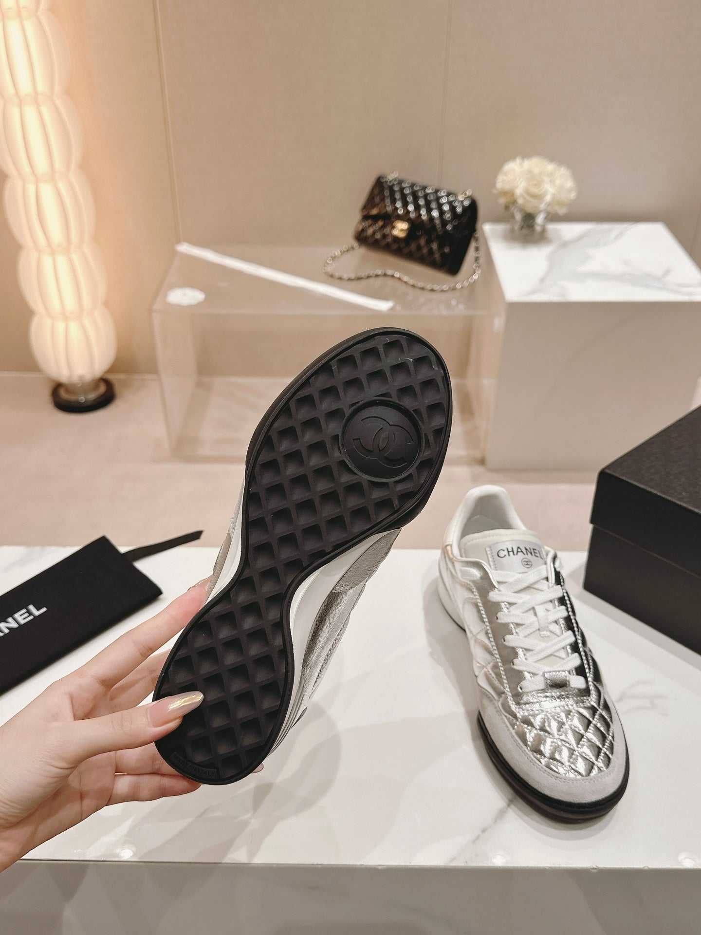 CHANEL SNEAKERS IN GLOSSY SILVER LAMBSKIN