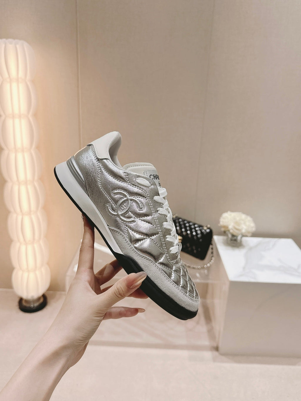 CHANEL SNEAKERS IN GLOSSY SILVER LAMBSKIN