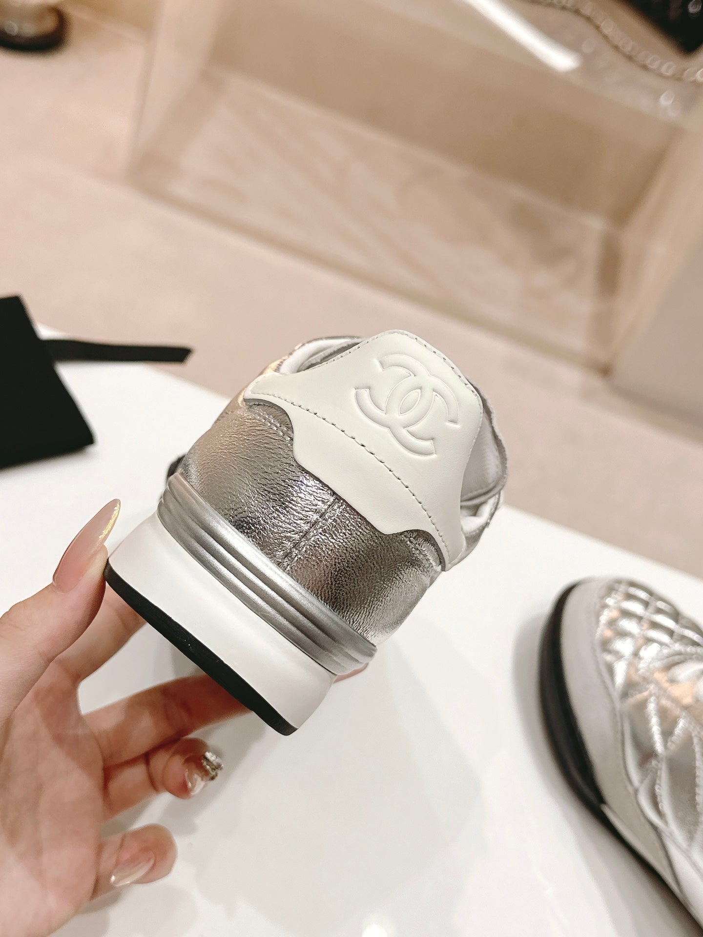 CHANEL SNEAKERS IN GLOSSY SILVER LAMBSKIN