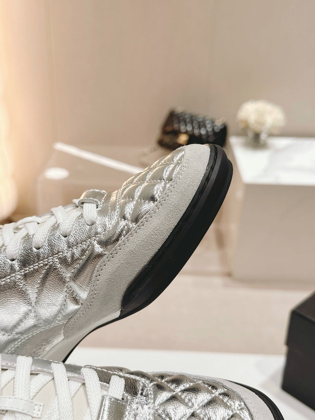 CHANEL SNEAKERS IN GLOSSY SILVER LAMBSKIN