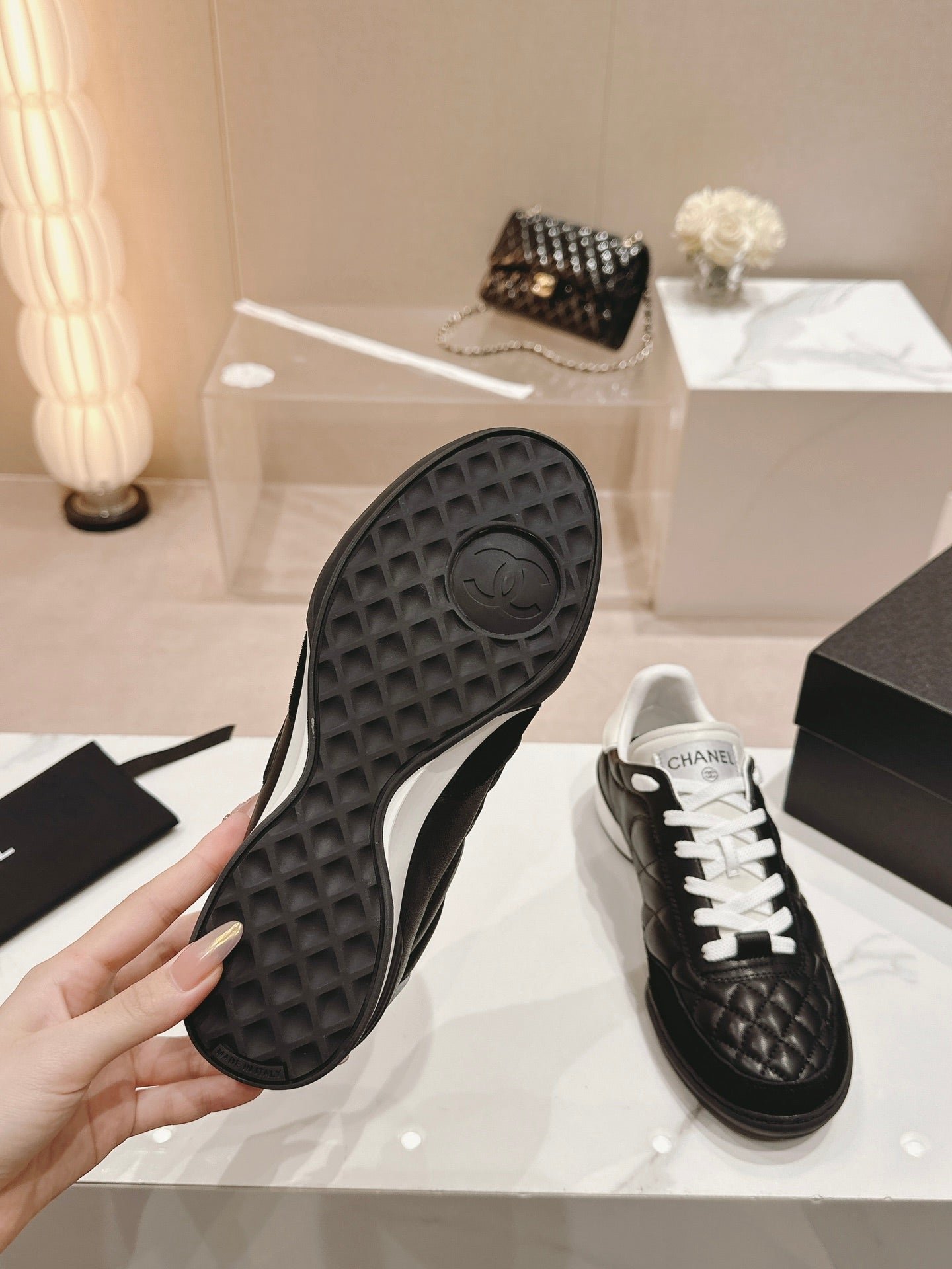CHANEL SNEAKERS IN GLOSSY BLACK LAMBSKIN