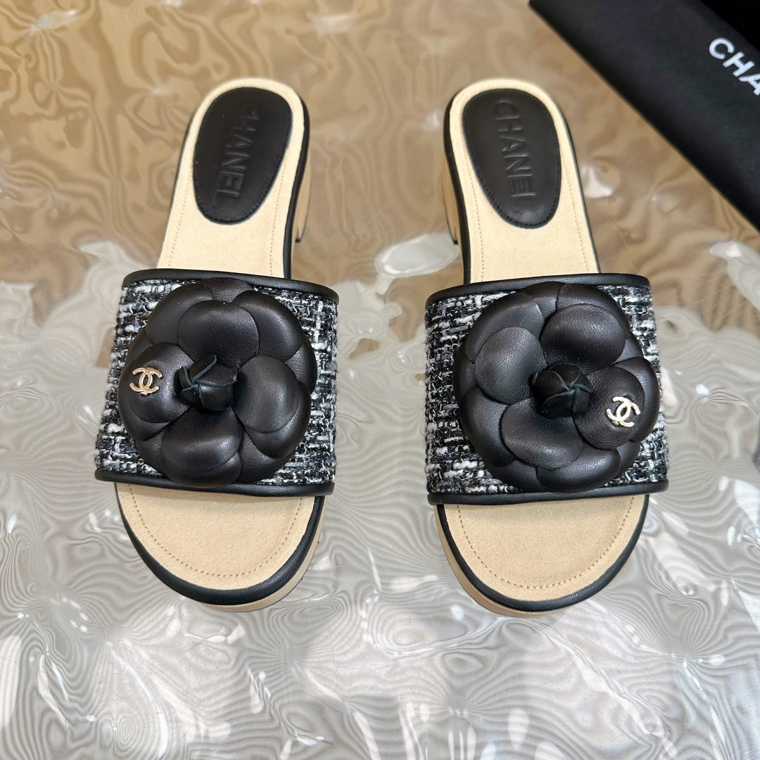 CHANEL PLATFORM SLIPPERS WITH FLOWER IN BLACK LAMBSKIN