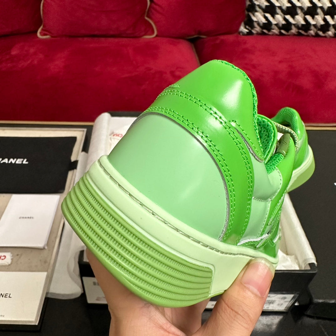 CHANEL TRAINERS IN LIGHT GREEN SHINY CALFSKIN