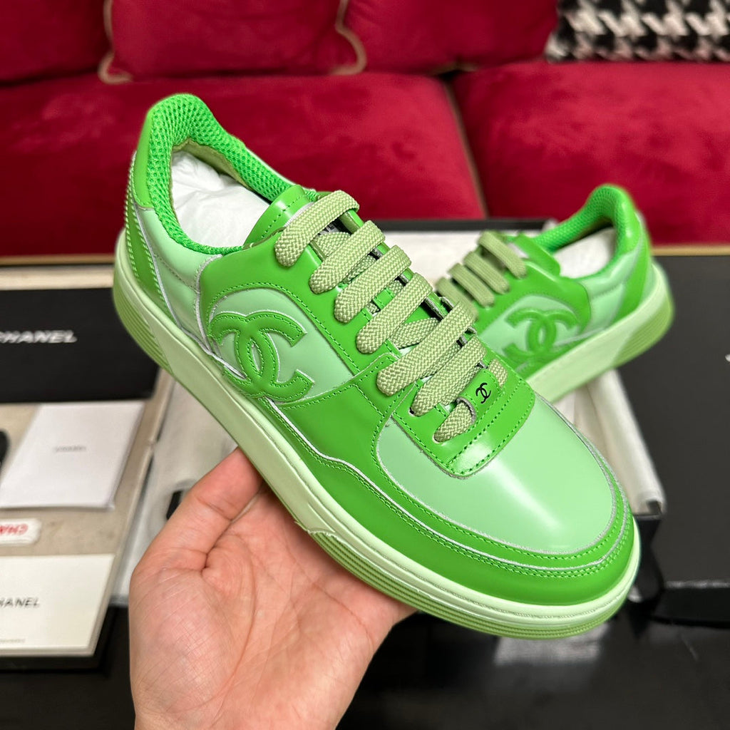 CHANEL TRAINERS IN LIGHT GREEN SHINY CALFSKIN