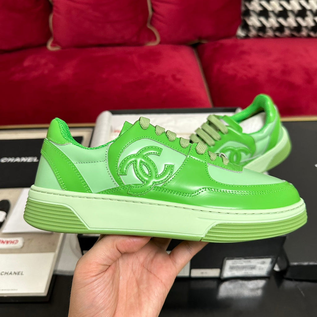 CHANEL TRAINERS IN LIGHT GREEN SHINY CALFSKIN