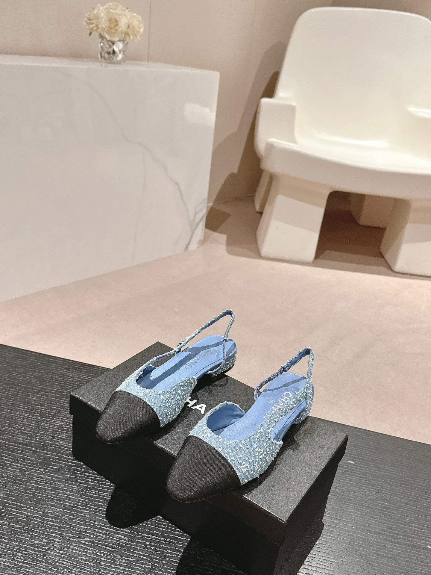 CHANEL SLINGBACKS IN LIGHT BLUE DENIM AND BLACK SATIN