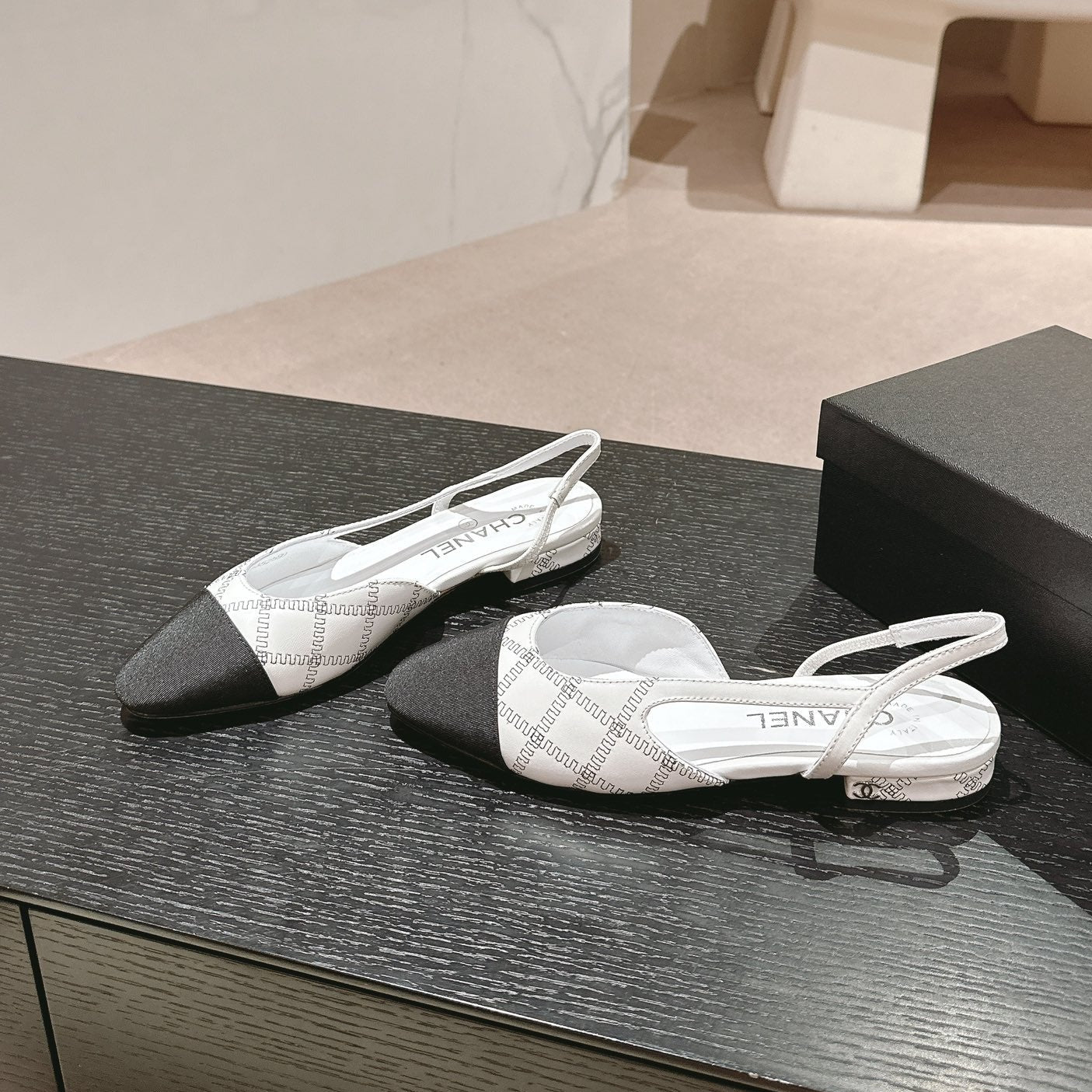 CHANEL SLINGBACKS IN WHITE LAMBSKIN AND BLACK SATIN