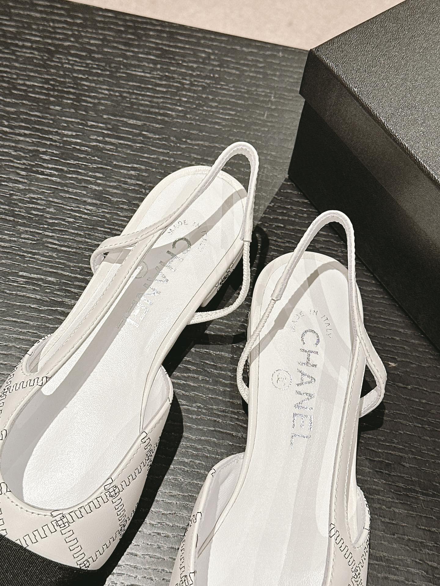 CHANEL SLINGBACKS IN WHITE LAMBSKIN AND BLACK SATIN