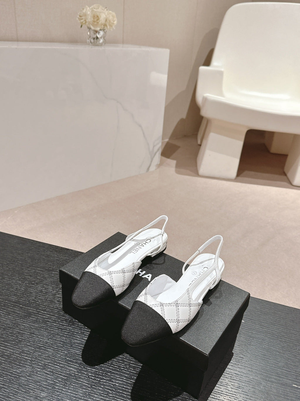 CHANEL SLINGBACKS IN WHITE LAMBSKIN AND BLACK SATIN