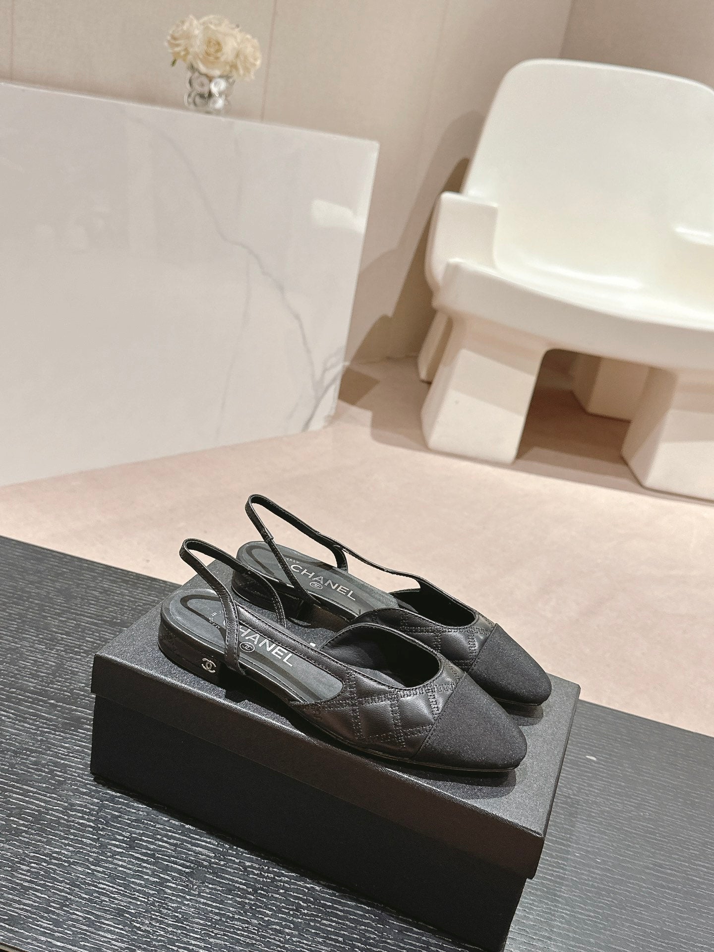 CHANEL SLINGBACKS IN BLACK LAMBSKIN AND SATIN